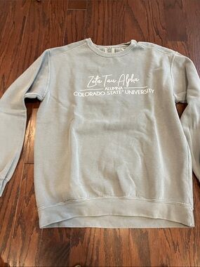 Comfort Colors Light Gray Crewneck Sweatshirt with White Zeta Tau Alpha Print